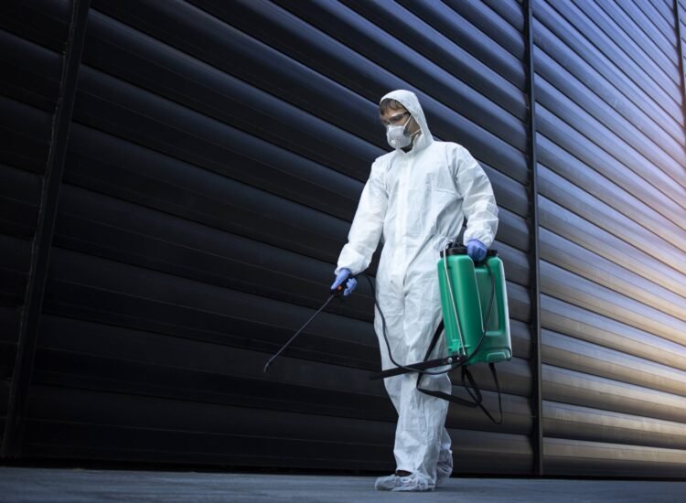 person-white-chemical-protection-suit-doing-disinfection-public-areas-stop-spreading-highly-contagious-corona-virus person-white-chemical-protection-suit-doing-disinfection-public-areas-stop-spreading-highly-contagious-corona-virus