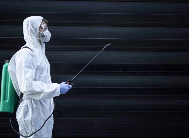 person-white-chemical-protection-suit-holding-sprayer-with-disinfectant-chemicals-stop-spreading-highly-contagious-virus person-white-chemical-protection-suit-holding-sprayer-with-disinfectant-chemicals-stop-spreading-highly-contagious-virus